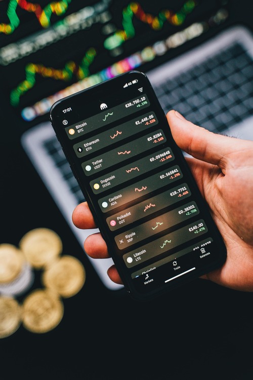 Person safely reviewing Bitcoin transaction details on a mobile device